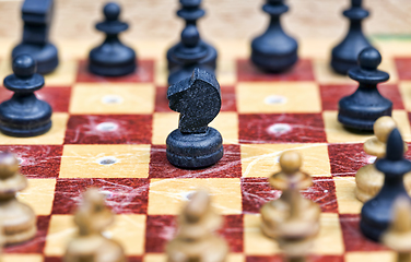 Image showing small old wooden chess