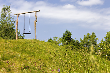 Image showing ordinary wooden swing