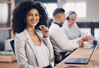 Image showing Portrait, call center and customer service with a black woman consulting in her telesales office for work. Contact us, support and telemarketing with a female employee or consultant using a headset