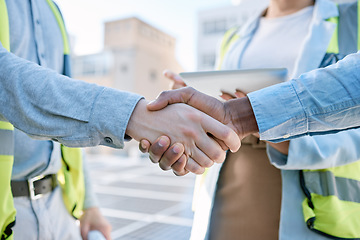 Image showing Handshake, engineering and meeting with people and solar panels for partnership, renewable energy or deal. Agreement, sustainability and thank you with engineer shaking hands for eco, b2b or welcome