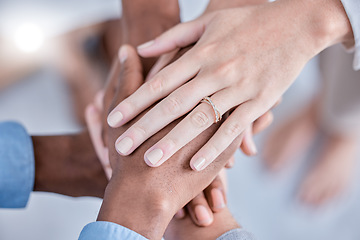 Image showing Business people, diversity and hands together above in trust, partnership or collaboration at the office. Group of diverse employee workers piling hand in teamwork, support or agreement in solidarity