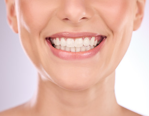 Image showing Teeth, dental and oral hygiene with a model woman in studio on a gray background for tooth whitening. Dentist, healthcare and veneers with a female indoor to show a happy smile at a mouth specialist