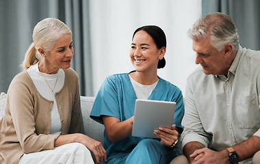 Image showing Asian nurse, elderly man and woman with tablet for consulting, healthcare or report for medical help. Japanese doctor, women or digital touchscreen ux in consulting room, happy or excited for results