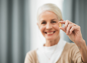 Image showing Pill, medicine and portrait of senior woman for pharmaceutical, medical product and retirement health. Happy elderly person hand holding tablet or supplement for healthy life and vitamins healthcare