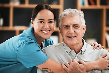 Image showing Asian nurse, elderly man and hug in portrait with support, empathy and nursing home care for retirement. Doctor, senior patient and kindness with solidarity, helping hand and excited face for embrace