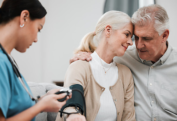 Image showing Hug, nurse or old couple with blood pressure test consulting in hospital to monitor heart healthcare. Doctor, hypertension consultation or medical physician with a patient for examination