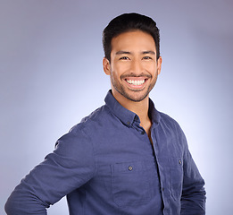 Image showing Business man, proud smile and portrait of a corporate manager from Thailand in a studio. Isolated, blue background and happiness of Asian businessman and entrepreneur ready as a professional