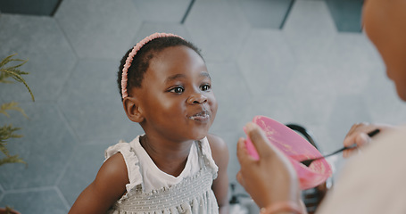 Image showing Mother, child and breakfast with mom feeding girl food for nutrition, growth health and wellness in home kitchen. Black woman with girl at family house for quality time, love and eating healthy