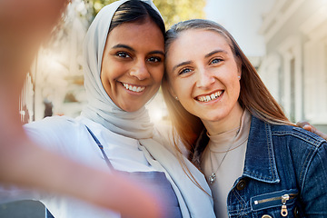 Image showing Selfie, friends and girls, hug and outdoor with happiness, reunion and cheerful together. Portrait, muslim women and ladies embrace for picture outside, bonding and travel for quality time and joy