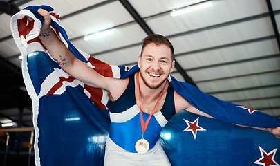 Image showing Win, gymnastics and portrait of a man with a flag for sports, achievement and celebration. Happy, celebrate and athlete gymnast with a smile for winning, medal and award for sport competition