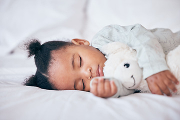 Image showing Black child, baby and sleeping with toy in bedroom, home and nursery for peace, calm nap and dreaming. Tired young girl kid asleep with teddy bear for resting, break and healthy childhood development