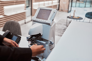 Image showing Optical lens machine, working optometrist and glasses construction of a healthcare worker. Vision assessment tools, wellness and medic employee planning a optometry project for medical work