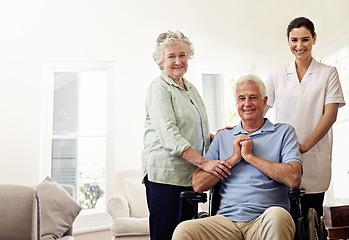 Image showing Portrait of old man in wheelchair, elderly couple with nurse and smile at nursing home for care and rehabilitation. Healthcare, disability and happy senior with caregiver and woman in living room.