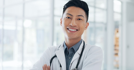 Image showing Asian man, face and doctor smile for healthcare, vision or career ambition and advice at the hospital. Portrait of happy and confident Japanese medical expert smiling, phd or medicare at the clinic