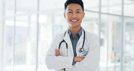 Image showing Asian man, face and doctor smile for healthcare, vision or career ambition and advice at the hospital. Portrait of happy and confident Japanese medical expert smiling, phd or medicare at the clinic