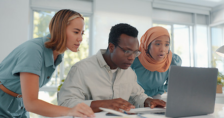 Image showing Laptop, good news and team in celebration of success, achievement or teamwork goal in the office. Diversity, celebrate and happy business people celebrating successful collaboration in the workplace.