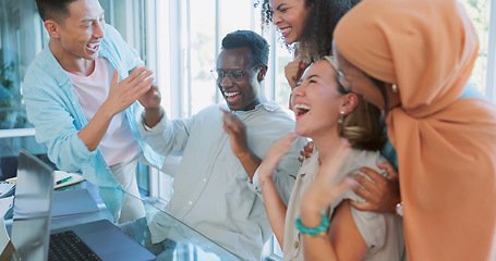 Image showing Business people, laptop and high five success in modern office for web design collaboration, goals achievement and celebration. Diversity, happy teamwork and support hands celebrate with tech device