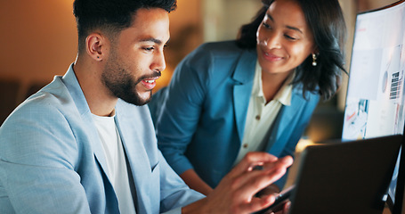 Image showing Man, woman and tablet in office at night for analytics, research and information technology with teamwork. Businessman, web design discussion and mobile touchscreen at pc, data analysis and mentor