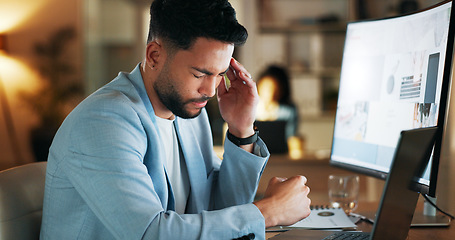 Image showing Stress, night and headache with businessman at desk for deadline, schedule or compliance. Tired, accountability and mental health with employee suffering with burnout, frustrated and overtime