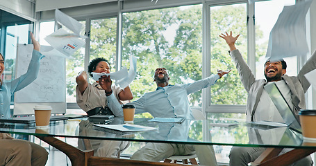 Image showing Celebration, teamwork and business meeting with documents in the air with motivation. Diversity, excited and celebrating tech analytics success of staff happy about collaboration and office goal