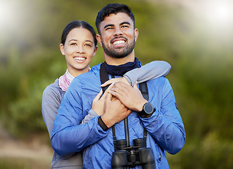 Image showing Fitness, couple and hug in nature, quality time and relax with smile, celebration and weekend break. Love, man and woman embrace, fresh air and getaway with tourism, trip and happiness with rest