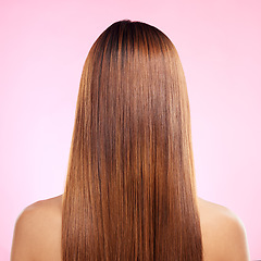 Image showing Beauty, hair and back of woman in studio for shampoo, keratin and salon treatment. Health, shine and self care with girl model and growth for glow, textures or cosmetology isolated on pink background