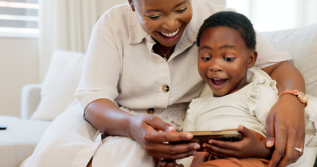 Image showing Surprise, phone and black family bonding on sofa in house or home living room with fun education, learning or esports game. Smile, happy or shocked mother and child on mobile technology with wow face