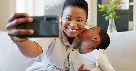 Image showing Smartphone, selfie and mother with child on living room sofa for social media post, parents blog update or family home celebration. Black family smile in cellphone portrait photography for online app