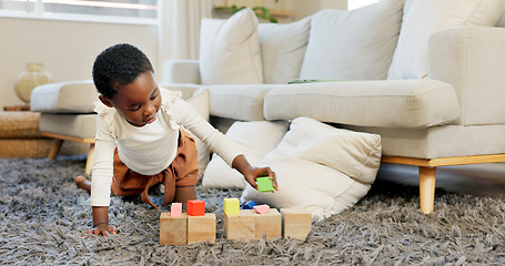 Image showing Black girl, building blocks and creative learning in family home lounge, growth and fun development. Happy african kids, educational brick toys and wood puzzle, montessori play and living room game