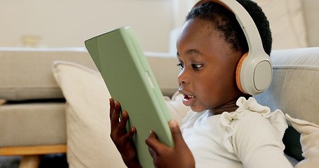 Image showing Language learning, headphones and black child with tablet for online education translation website or video call. Relax kid with digital technology listening and speaking for online learning games