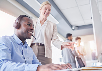 Image showing Manager woman, call center and computer desk for support, advice or help with telemarketing sales. Black man consultant or agent with mentor for CRM, customer service or contact us consultation