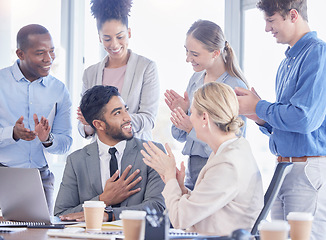 Image showing Business, team and man with promotion, applause and happiness for success, new project and workplace. Male leader, staff and group clapping, achievement and celebration for profit growth and office