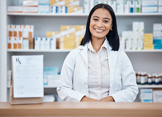 Image showing Pharmacy portrait, medicine pills and pharmacist in drugs store, pharmaceutical shop or healthcare dispensary. Hospital retail manager, package stock product and happy medical woman for help support