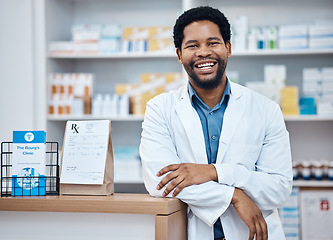 Image showing Pharmacy portrait, medicine pills and happy man in drugs store, pharmaceutical shop or healthcare dispensary. Hospital retail clerk, medical commerce business and African pharmacist for help support