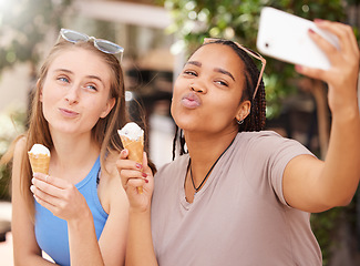 Image showing Friends with ice cream, kiss and selfie outdoor with travel, happy with dessert and spending time together on vacation. Social media post, pout face in picture and young female eating gelato in Italy