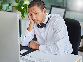 Image showing Burnout, call center or tired agent sleeping at desk from overworked by deadlines or stress. Customer support, black man or lazy telemarketing consultant at computer exhausted, fatigue or resting