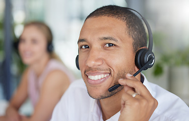 Image showing Smile, headset and portrait of a man in a call center for online support, consulting and advice. Happy, conversation and face of a customer service agent working in telemarketing, sales and helpline