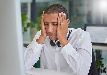 Image showing Stress, anxiety or black man in call center with burnout or migraine pain at customer services help desk. Tired, headache or sick sales consultant frustrated with mistakes in a telemarketing company