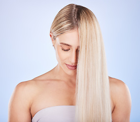 Image showing Face, hair care and beauty of woman with eyes closed in studio isolated on a background. Cosmetics, keratin and young female model with salon treatment for long hairstyle, blonde balayage and growth.