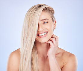 Image showing Portrait, hair care and face beauty of woman in studio isolated on a background. Cosmetics, keratin and happy young female model with salon treatment for long hairstyle, blonde balayage and growth.