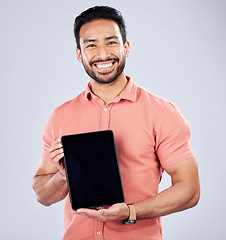 Image showing Asian man, portrait or tablet screen on isolated studio background on finance mockup, fintech mock up or loan product placement. Smile, happy or freelance trader on technology, stock market or deal