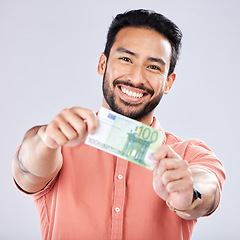 Image showing Asian man, portrait or showing money on isolated background in financial freedom, stock market profit or investment. Smile, happy or winner cash on studio for finance success, savings or trade growth