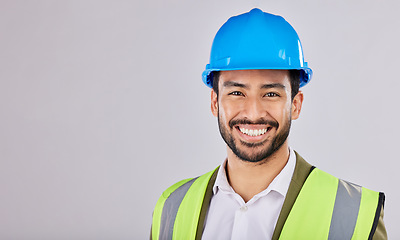 Image showing Portrait, civil engineering or contractor in studio with smile after planning a real estate building construction. Designer, architecture or happy man with vision of renovation in project management