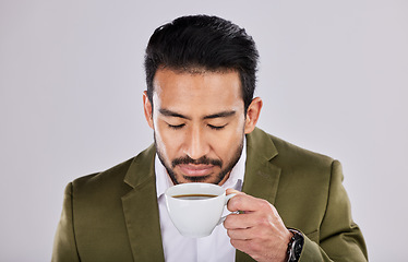 Image showing Coffee, smell and man in studio drink for energy, caffeine boost and relaxing for cafe breakfast. Happiness, aroma scent and calm male with latte, cappuccino and beverage in cup on white background