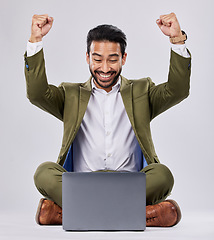 Image showing Asian man, laptop or success fist on isolated studio background for financial growth, stock market deal or future security. Smile, happy or cheering businessman with winner hands, technology or loan