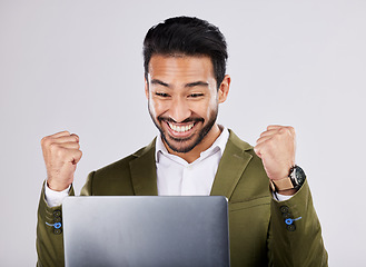 Image showing Asian businessman, laptop or success fist on isolated studio background for financial growth, stock market deal or future security. Smile, happy or cheering man with winner hands, technology or loan