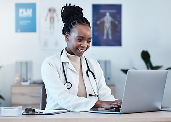 Image showing Laptop, medical research and doctor typing medicine report, healthcare study or review digital archive database. Reading online info, hospital clinic and black woman doing analysis of health results