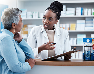 Image showing Pharmacy, medical or insurance with a customer and black woman pharmacist in a dispensary. Healthcare, clipboard and trust with a female medicine professional helping a patient in a drugstore