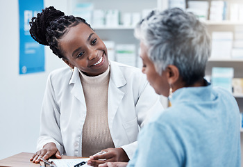 Image showing Pharmacy, healthcare or medical with a customer and black woman pharmacist in a dispensary. Medical, insurance and trust with a female medicine professional helping a patient in a drugstore