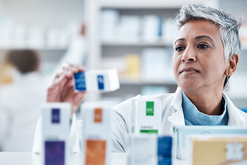 Image showing Elderly woman, pharmacist and check with box, medicine or pills by shelf in store for healthcare services. Senior pharma expert, retail stock and medical product for mockup space, health and wellness